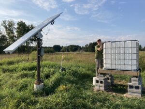 Dani Fegan near new solar powered well