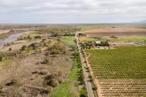 San Joaquin Valley agricultural region with river and orchards
