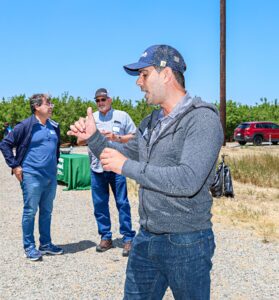 man talking in farm yard